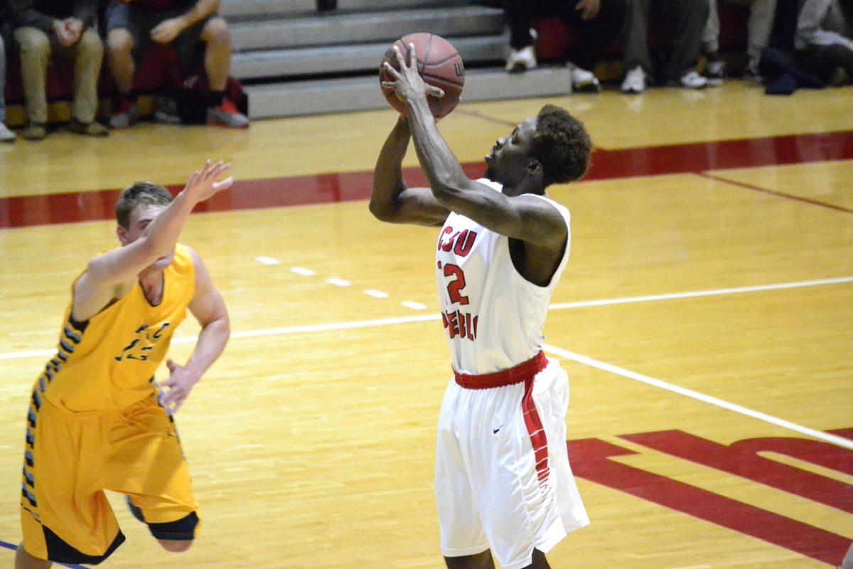 Devonte Malcom puts up a shot during the RMAC Shootout Quarterfinal. Photo by Dustin Cox