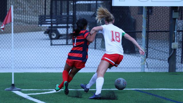 CSU-Pueblos Jessica Westoff holding off a defender in the second half ~ image courtesy of Nelson Kahler