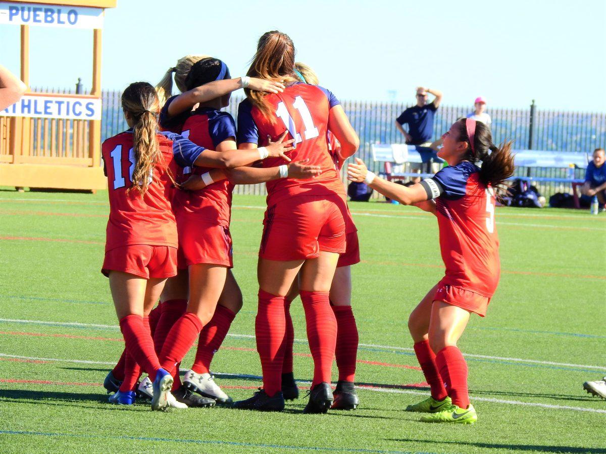 CSU-Pueblos+Laikyn+Koss+%2811%29+celebrates+with+teammates+after+her+second+half+goal+against+Colorado+Christian+University+on+Sunday+at+Art+%26+Gonzales+Stadium.+Photo+by+Rulo+Yimar+Reyes.