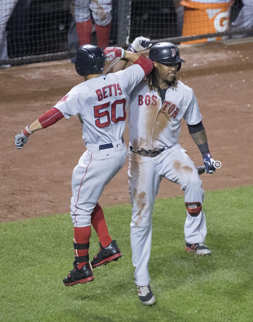 Red+Sox+outfielder+Mookie+Betts+and+infielder+Hanley+Ramirez+celebrate+during+a+game+in+Baltimore.+Photo+by+Keith+Allison+