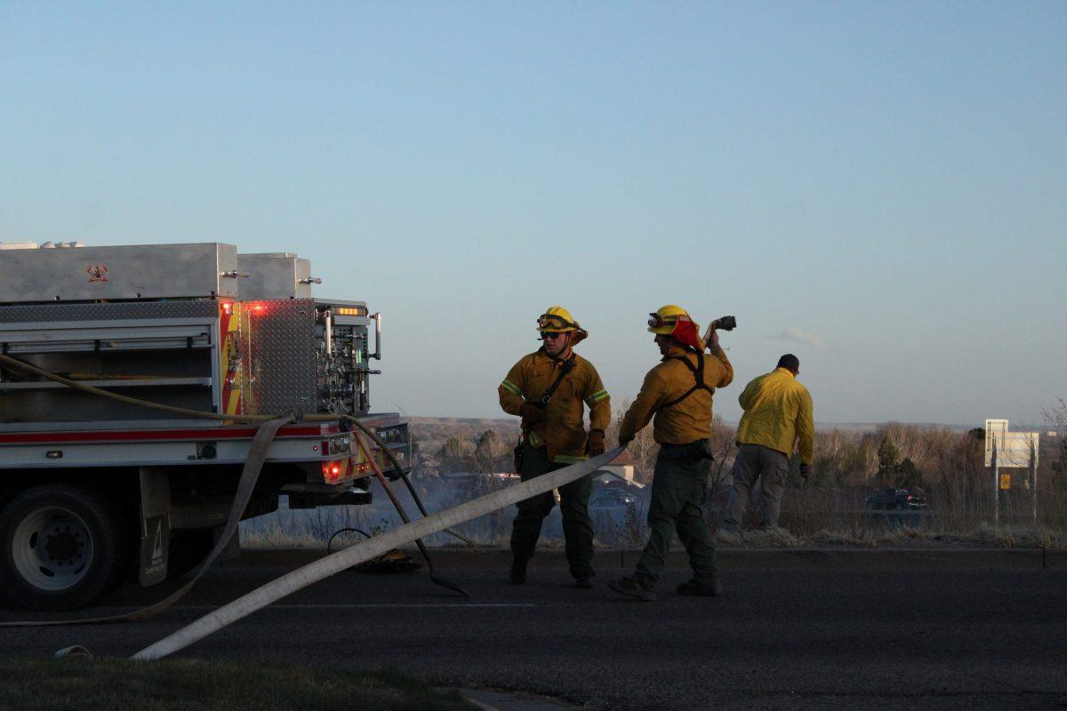 Pueblo Rural Fire Department crews help to manage a wildfire blaze from  Bartley Boulevard Tuesday, April 12. The fire broke out shortly after 6 p.m. and was batted down roughly two hours later, after at least five departments responded to the call. [Today photo/Austin Belore]