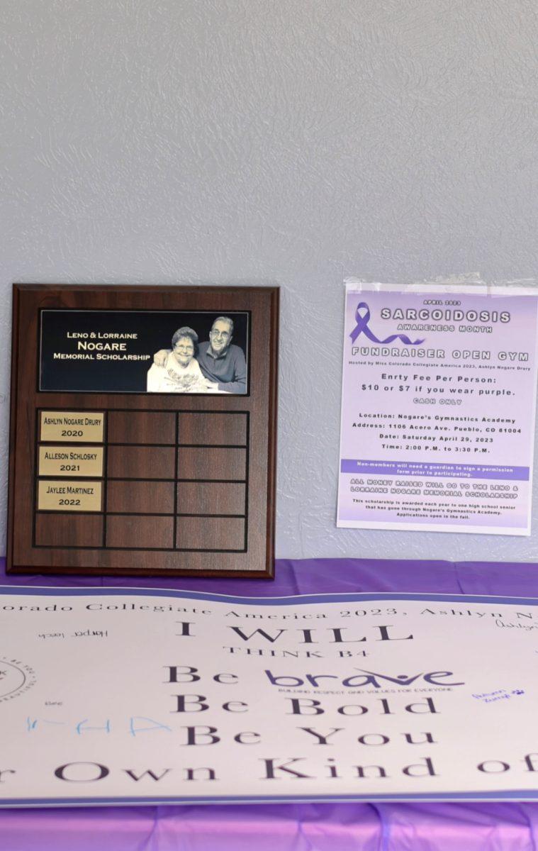 The Leno and Lorraine Nogare Memorial Scholarship plaque is displayed in the entryway of the Sarcoidosis Awareness Open Gym Fundraiser hosted at Nogares Gymnastics Academy. Photo by Ashlyn Drury. 