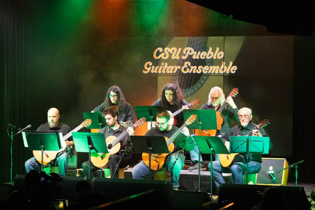 The CSU Pueblo Guitar Ensemble are shown on stage playing guitars during its Rocky Mountain Rhythm performance, which took place on Feb. 22 in the TV studio at the Buell Communications Center. (Photo by Holly Ward) 