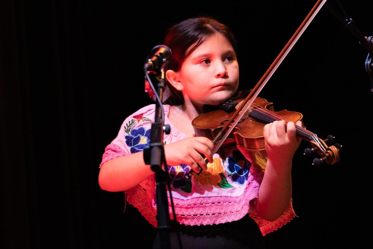 Phoenix Benavidez plays the violin during Mariachi Diamante’s performance for Rocky Mountain Rhythm on Feb. 15. (Photo by Quinna Rollings)