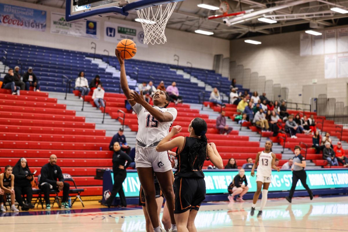 Alisha Little of CSU Pueblo makes layup in game against Northern New Mexico early in the season. (Photo by Ashlyn Drury)