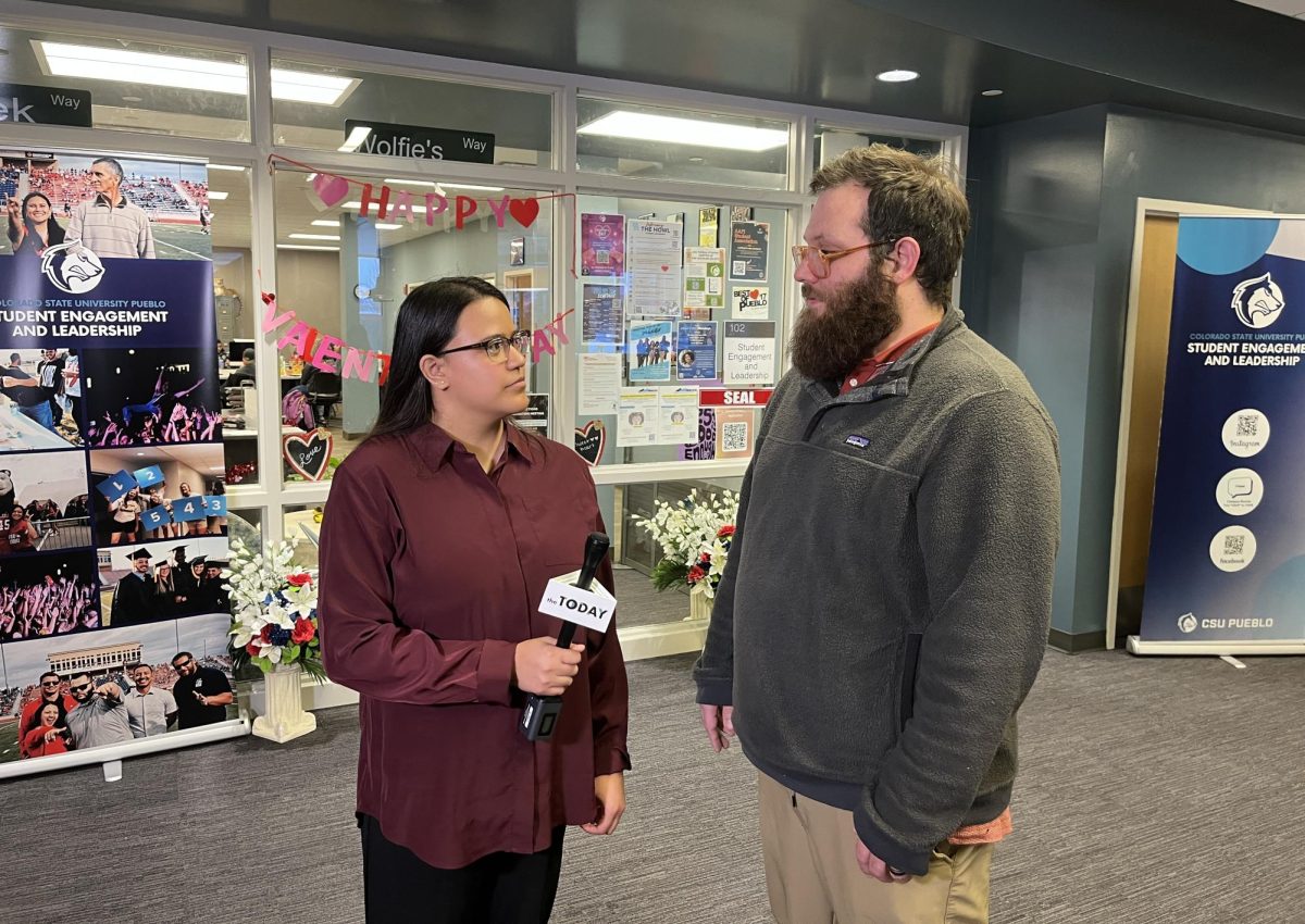 The Today reporter Quinna Rollings (left) interviews Joe Yevara (right), who serves as the interim assistant dean for Student Engagement and Leadership at CSU Pueblo. (Photo by Holly Ward)