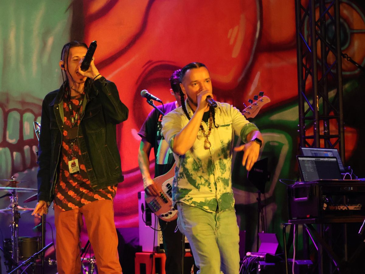Hugo Rodriguez (left) and Owen Trujilo (right), singers from the group 2MX2 performed at the CSU Pueblo stage, located at La Bella Union Plaza during the Steel City Music Showcase on April 12th. 