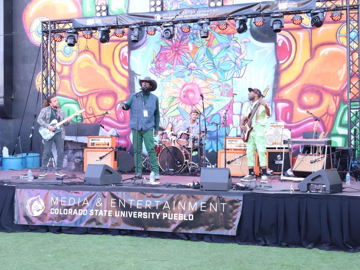 Morgan J. Cox and his band are shown performing at the CSU Pueblo stage, located at La Bella Union Plaza during the Steel City Music Showcase on April 11th. 