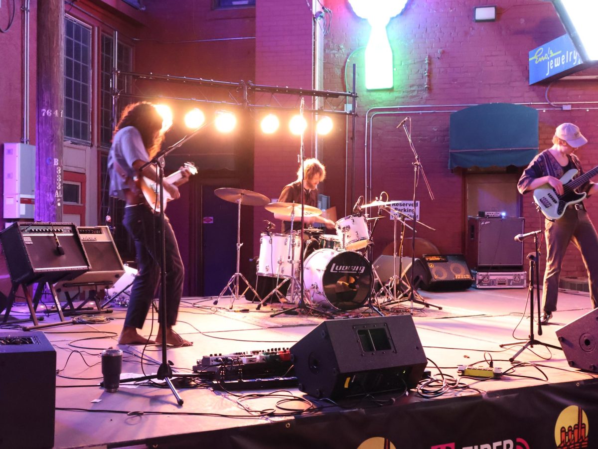 The band Shadow Work is shown performing at the Neon Alley Stage stage during the Steel City Music Showcase on April 11. 