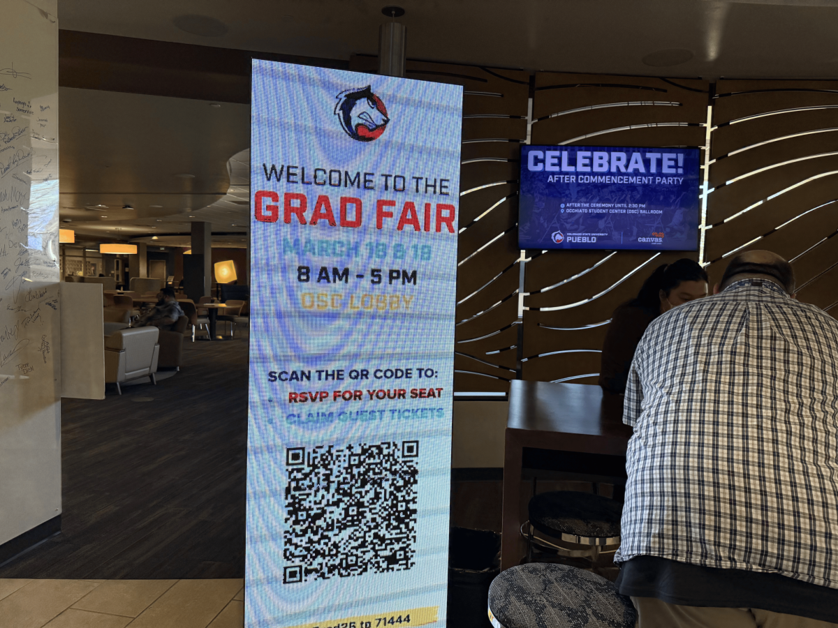 A sign with ticket information for graduating seniors at the 2026 graduation fair (photo by Emma Harry).