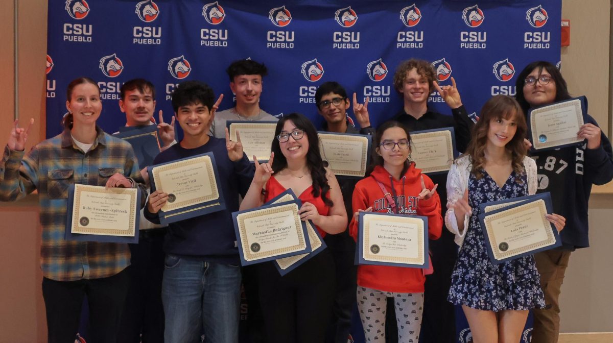 MAE students presenting their awards (photo by Gabryelle Martinez).